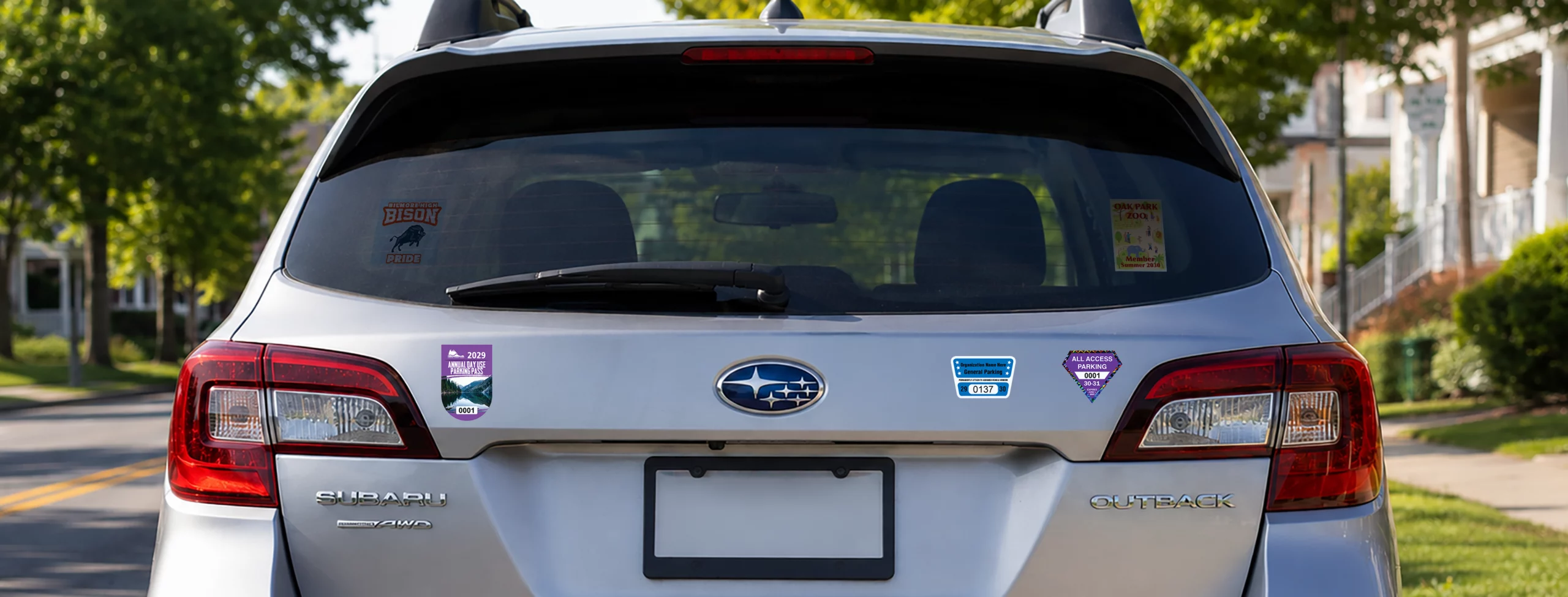 Parking Permit Decals Materials Blog Image showing the back of a car with multiple decals on display