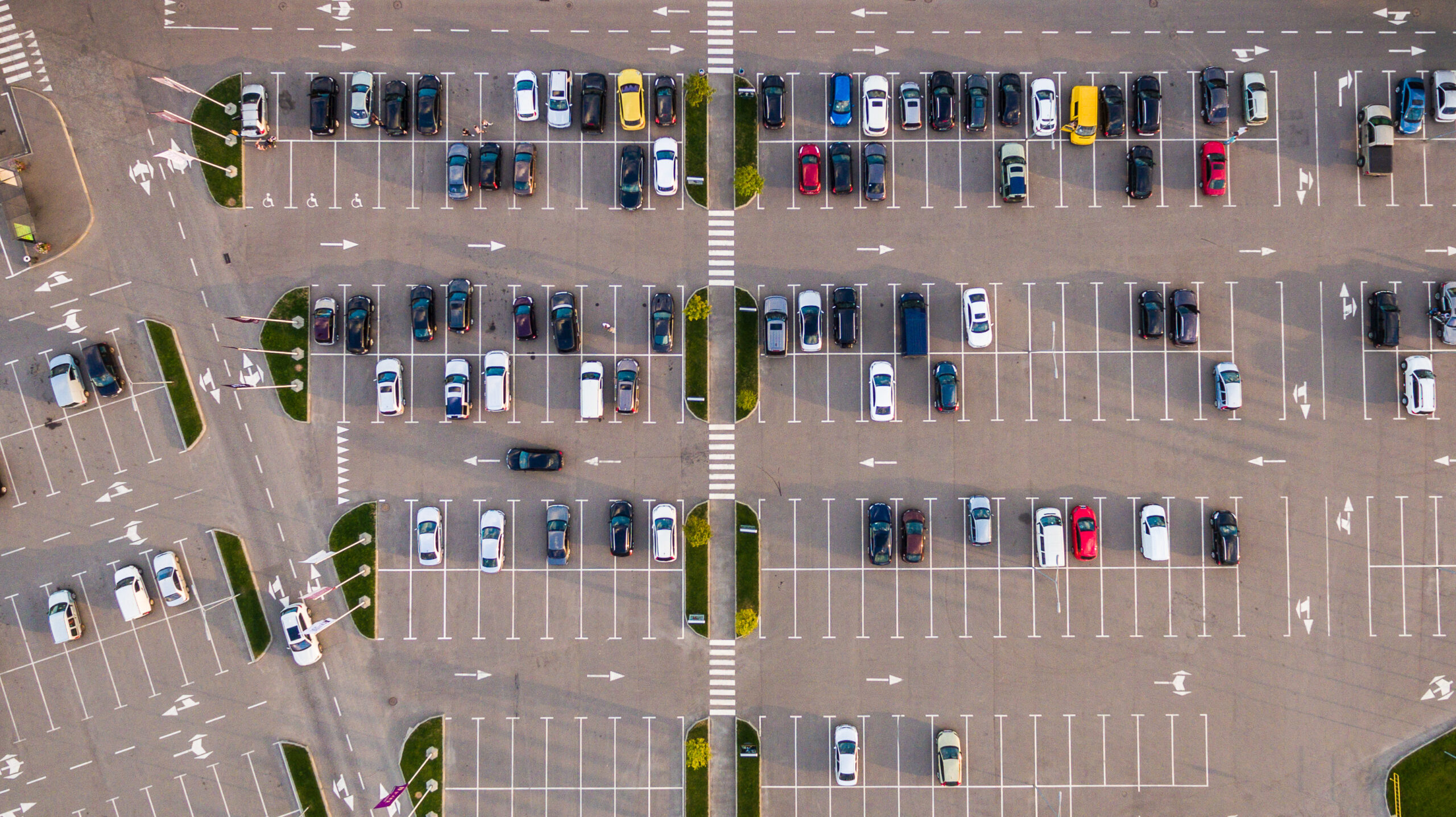 Aerial view of college parking lot full of cars